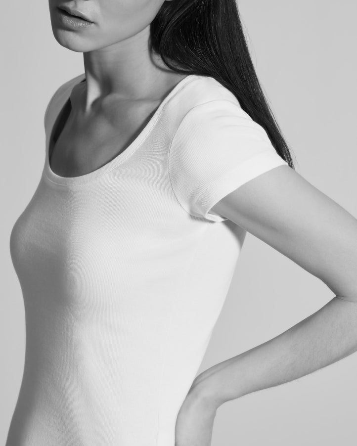 woman in ribbed scoop-neck cotton white t-shirt